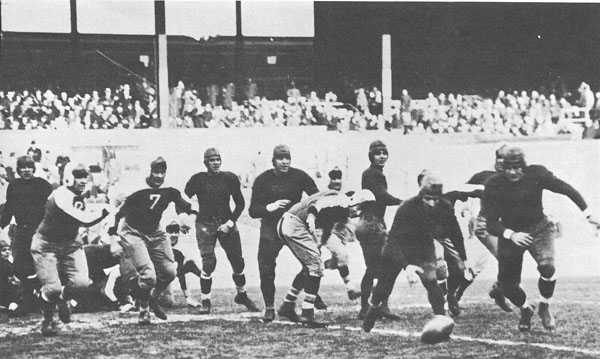 Molesworth and Nagurski go after a fumble.